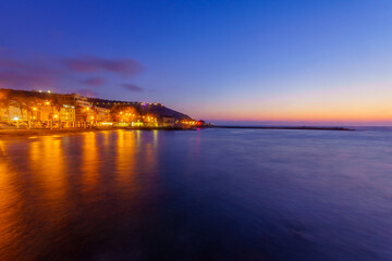 Fototapeta premium Evening view of Bat-Galim beach, with Mount Carmel. Haifa