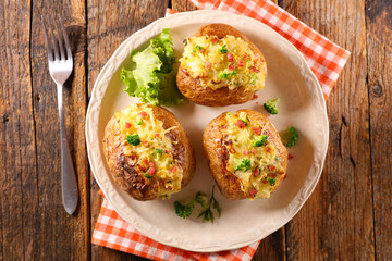 baked potato with cream and cheese