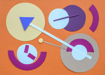Clocks of different sizes and shapes on orange background. Paper collage. Time concept.
