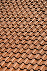 Repetitive pattern of orange roof tile 