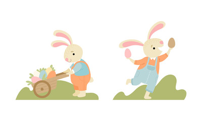 Cute Easter Bunny with Long Ears in Jumpsuit Pulling Wheelbarrow with Eggs Vector Set