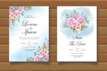 Beautiful floral wedding card on wooden background