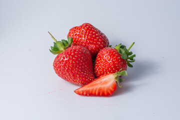Strawberry isolated. Strawberries isolate. Whole, half, cut strawberry on white. Strawberries isolate. Side view organic strawberries.