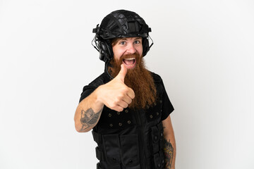 Redhead SWAT isolated on white background with thumbs up because something good has happened
