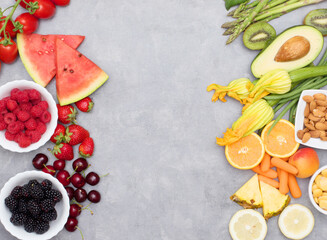 Healthy food. colored and various Vegetables and fruits on grey background