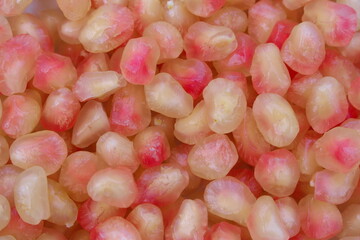 light pink pomegranate seed background