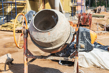 Industrial concrete mixer at a construction site. Preparation of concrete and mortar.