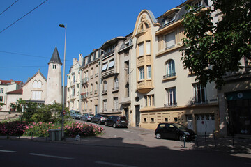 art déco flat buildings and medieval tower in nancy in lorraine (france) 