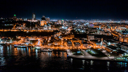 Fototapeta na wymiar Aerial view of Quebec City skyline in Canada at night from drone