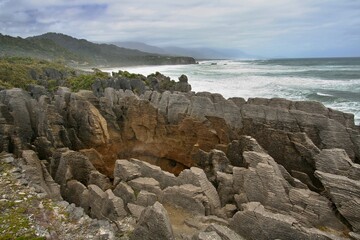 Fototapeta na wymiar View of Pancake Rocks and Blowholes and Tasman Sea, Paparoa National Park. South Island. New Zealand.