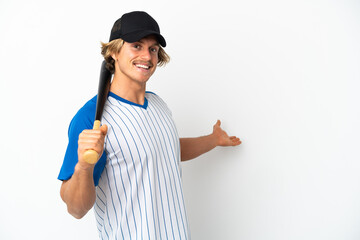 Young blonde man playing baseball isolated on white background extending hands to the side for inviting to come