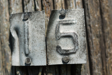 old wooden door with number