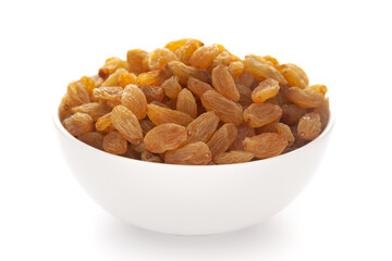 Close-up of golden raisins (dry grapes )in a white ceramic bowl over white background.