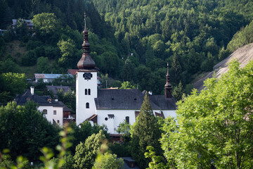 Church in old mining village Spania Dolina, Slovakia - obrazy, fototapety, plakaty