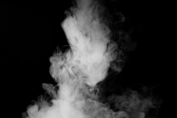 white smoke on black background for overlay effect. a realistic smoke effect for creating an intense nuance in a photo.