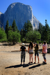 Fototapeta na wymiar Yosemite National Park El Capitan with Pine Trees and Tourists