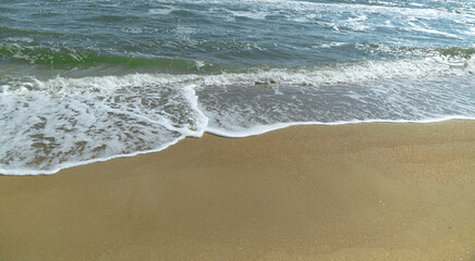Beautiful tide waves on the seashore