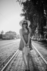 woman walking on the railway
