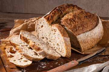 Freshly artisan baked wheat and rye bread, country bread. Simple bread  with butter for breackfast