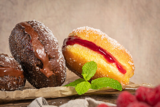 Bolas de Berlim, or "Berlin Balls". Portuguese fried dough with sugar, Filled with chocolate or raspberry jam. Portuguese fried dough with sugar. 