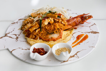 Pad Thai - stir-fried rice noodles with shrimp , Thai food style