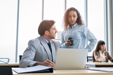 young business people discussing and brainstorming at modern office
