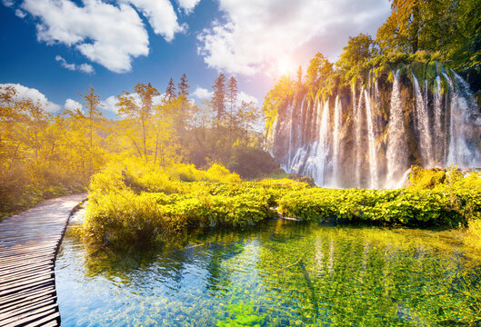 Magical view of the grand waterfall on a sunny day. Plitvice Lakes National Park, Croatia.