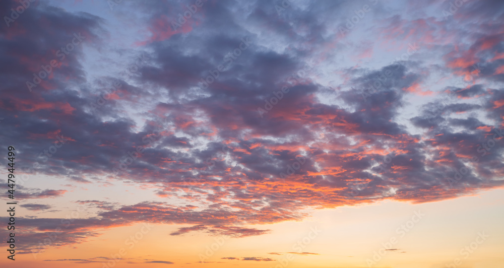 Sticker Fantastic colorful sunrise with cloudy sky. Image template of textured sky.