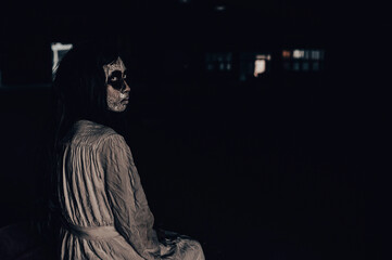 Portrait of asian woman make up ghost,Scary horror scene for background,Halloween festival...