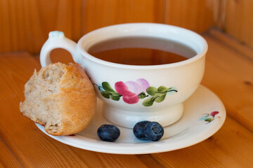 Bread texture close up. Fresh bread bun with tea close-up.
Whole grain bread on a plate close-up. Fresh bread Healthy food and traditional bakery concept