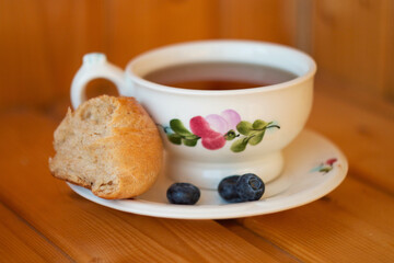 Bread texture close up. Fresh bread bun with tea close-up.
Whole grain bread on a plate close-up. Fresh bread Healthy food and traditional bakery concept