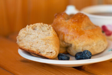 Bread texture close up. Fresh bread bun background close-up shoot.
Whole grain bread on a plate close-up. Fresh bread Healthy food and traditional bakery concept