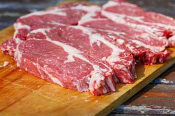 Raw marbled beef steak.  Meat for grilling. Selective focus