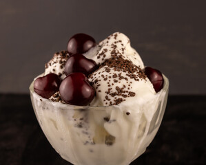 melted ice cream with chocolate chips and cherries