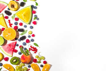 Summer vitamin food concept, various fruit and berries watermelon peach plum apricots blueberry currant, flat lay on white background top view copy