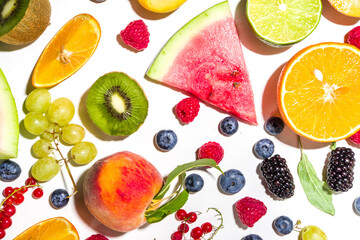 Summer vitamin food concept, various fruit and berries watermelon peach plum apricots blueberry...