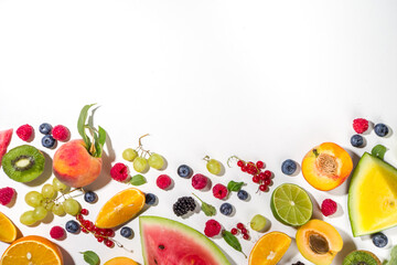 Summer vitamin food concept, various fruit and berries watermelon peach plum apricots blueberry currant, flat lay on white background top view copy