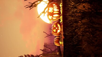 vertical Halloween animated 4k background. scary and Spooky pumpkin in fire. around mystic evening and cemetery . High quality 4k footage - Powered by Adobe