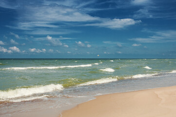 Fototapeta premium Soft sea waves on a sandy beach