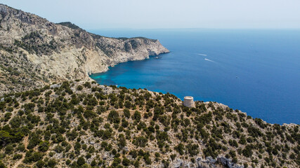 Aerial view of the Torre des Savinar, at the western tip of Ibiza island in the Balearic Islands, Spain - Medieval fortified tower overlooking the Mediterranean Sea