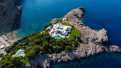 Luxurious mansion on a private islet north of Ibiza island in Spain - Large property with a white villa along the Mediterranean Sea in the Balearic Islands