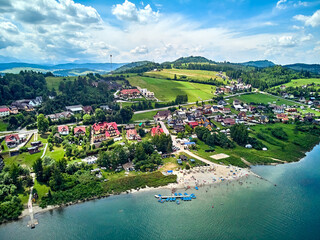 Beautiful aerial panoramic view of the Lake Czorsztyn (Polish: Jezioro Czorsztynskie) is a man-made reservoir on the Dunajec river, southern Poland, between the Pieniny and the Gorce Mountains