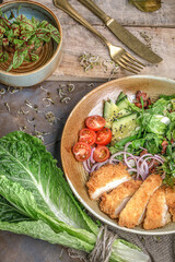 Delicious fresh salad with crispy grilled chicken breast