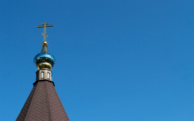 the dome of an Orthodox church with a cross
