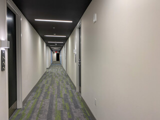 A sterile hallway in an apartment building