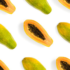 Fresh ripe papaya seamless pattern on white background. Tropical abstract background. Top view. Creative design, minimal flat lay concept. Trend tropical fruit food background pattern