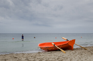 LIFEBOAT - With safety of life and health of vacationers resting on the sea beach