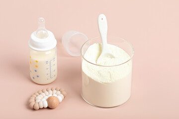 Preparation of formula for baby feeding. Baby health care, organic mixture of dry milk