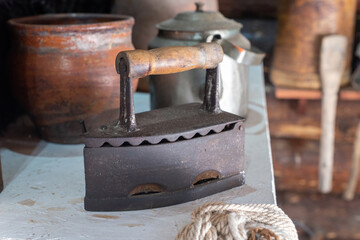 Antique iron in a country house, shallow depth of field.