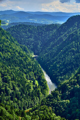 Beautiful aerial panoramic view of the Pieniny National Park, Poland in sunny day from Sokolica and Trzy Korony - English: Three Crowns (the summit of the Three Crowns Massif) on on the Dunajec river © udmurd